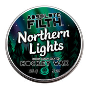 Absolute Filth tin front view showing Northern Lights wax and branding benefit: portability