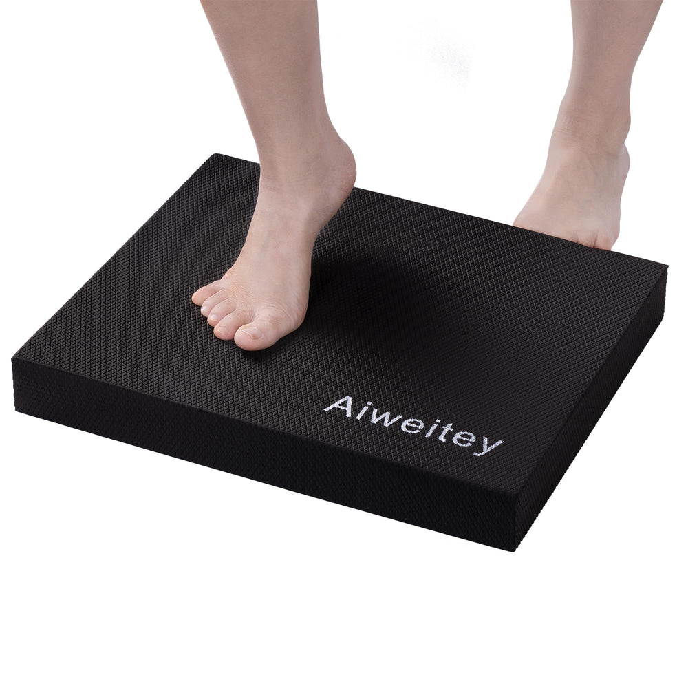 Aiweitey stability trainer pad front view showing compact black foam benefiting portable workouts