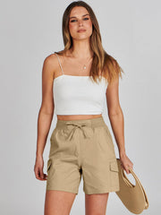ANRABESS detail of flap leg pocket holding essentials securely on trail