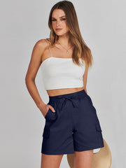 ANRABESS pocket detail with leg flap and hip pockets showing secure storage benefit