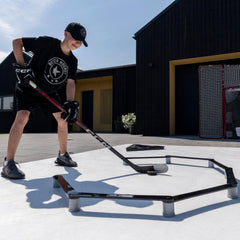 Better Hockey trainer stretched out showing 126-inch scale for extended stickhandling reps