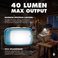 BLACK DIAMOND Wiz Kid in use at campsite providing hands-free gentle illumination