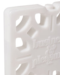 Business & Pleasure Co. Breeze Block next to a water bottle demonstrating scale
