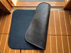 Cape Marine close-up of navy fibers and gray anchor script showing durable marine texture