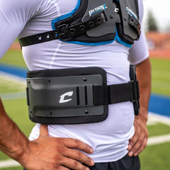 CHAMPRO protector mounted on shoulder pad in use for added impact absorption
