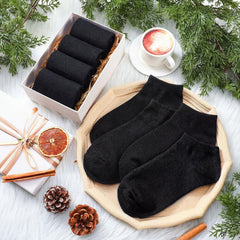 Cutecrop ankle sock worn inside boot demonstrating fit and moisture control