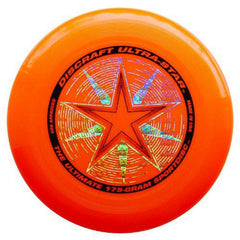 Discraft discs stacked beside a measuring tape showing official 175g competition weight