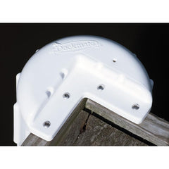 Dockmate bumper mounted on dock in use protecting hull from impact