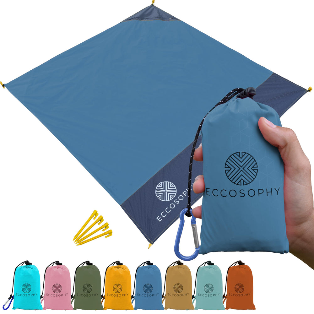 ECCOSOPHY folded blanket front view showing compact pouch and carabiner for easy transport