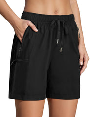 Enaisyl front view of black hiking shorts showing clean silhouette and mobility benefit