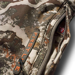 First Lite Specter muff worn on treestand keeping hands warm and ready
