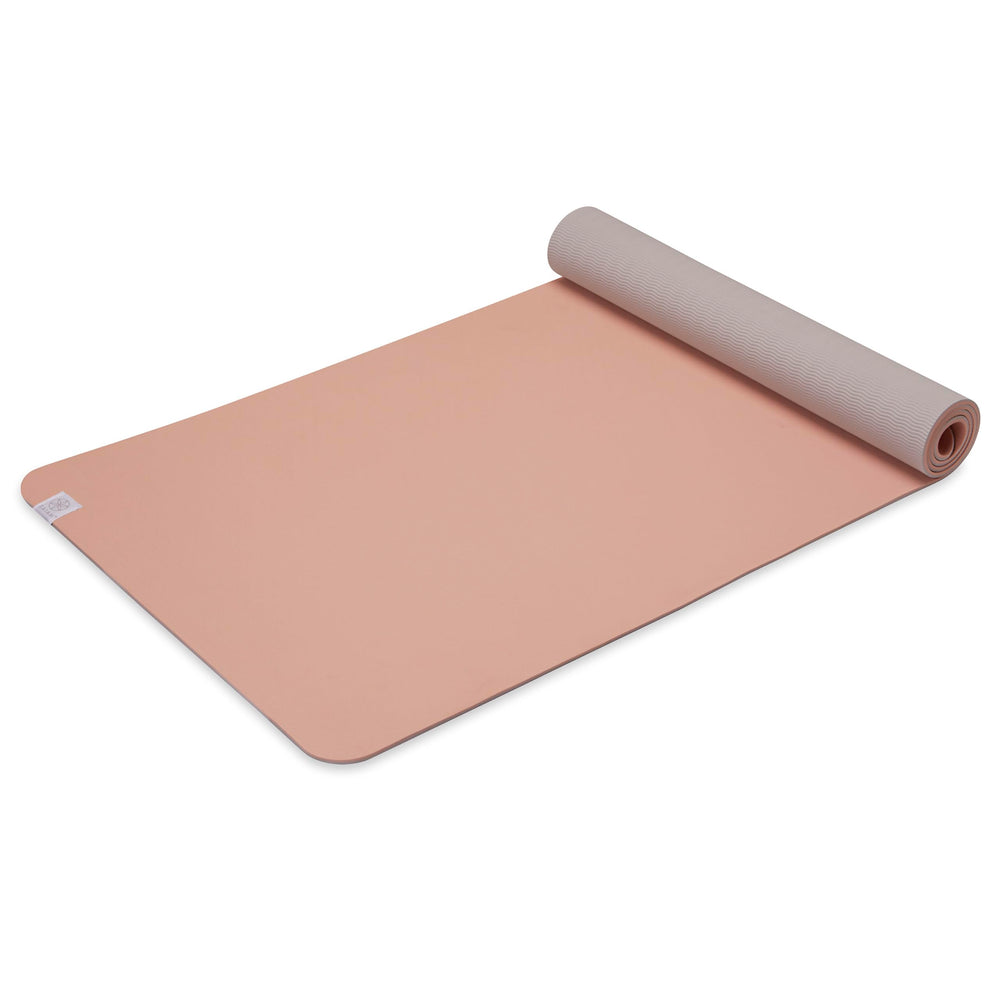 Gaiam TPE mat front view showing full length and blush color for confident practice