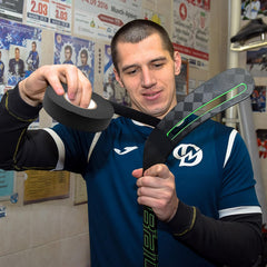 Guirnd hockey tape wrapped on a hammer handle enhancing grip and comfort