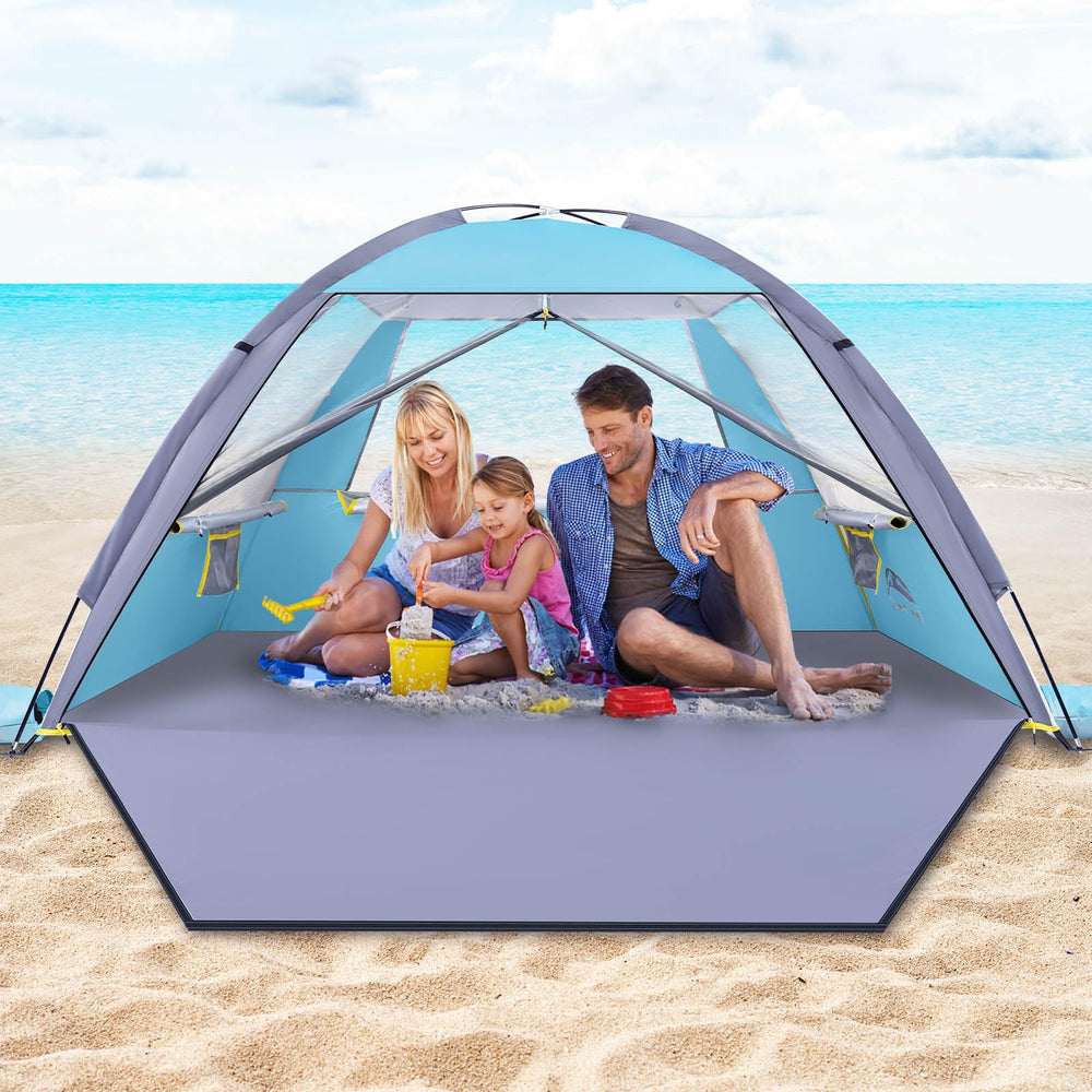 HAPPY TRAVEL front view of beach tent showing full shade and family capacity
