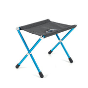 Helinox Speed Stool front view showing compact black seat and stable stance for portable comfort