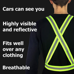 HiVisible construction worker wearing strap over jacket for enhanced roadside visibility
