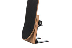 J JACKCUBE DESIGN front view of skateboard stand shows compact, elegant storage