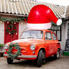 JellyArch front view of inflatable Santa hat showing bright LEDs and large size for impact