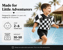 KIDSco swim vest shoulder strap closeup showing adjustable strap for customized fit