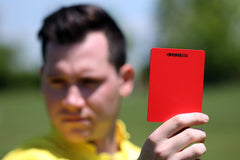 Kwik Goal referee wallet open with warning cards and score pad for organized match records