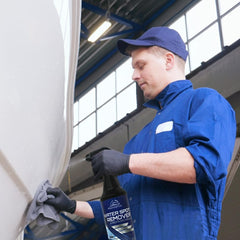 Marinamax being applied to a boat hull illustrating effective spot removal and time savings