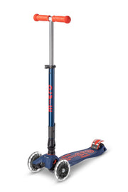 Micro Kickboard Maxi front profile showing foldable T-bar and LED wheels for easy transport