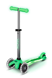 Micro Maxi Glow front view showing bright deck lights and stable three-wheel design