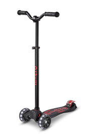 Micro Maxi Pro front view showing stable three-wheel design and wide LED wheels