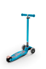 Micro Maxi adjustable anodized aluminum T‑bar being raised for growing riders