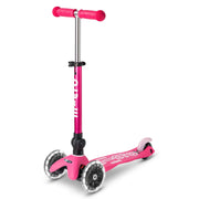 Micro front view of folded scooter showing compact portability and practical carry benefit