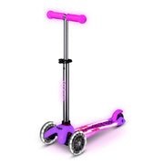 Micro Mini Glow front view showing compact Frosty Pink scooter and LED deck, great visibility