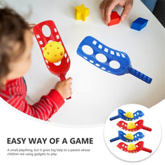 MUCKLILY scoops held in a child’s hand demonstrating easy grip for improved coordination
