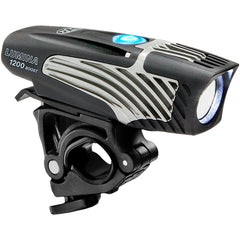 NiteRider Lumina Boost front light mounted on handlebars showing wide bright beam for trail visibility