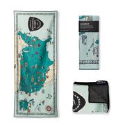 Nomadix front view showing full National Parks map print and lightweight benefit