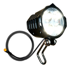NULKOMMA front view headlight showing compact design and easy mount benefit