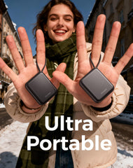 OCOOPA UT5 Nano next to a smartphone for scale showing pocket-friendly size