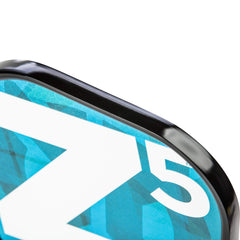 Onix Z5 next to ruler and ball showing dimensions and balanced midweight performance