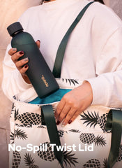 Opard bottle seated in car cup holder for spill-free commuting convenience