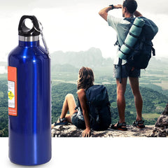 OsAtNb bottle clipped with carabiner showing easy attachment and hands-free carry