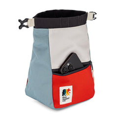 Oso Supply Co close-up of zippered pocket and mesh pouch organizing phone keys and brush for convenience