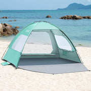 OutdoorMaster front view of tent on sand showing roomy shaded shelter benefit