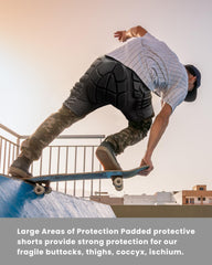 OutdoorMaster snowboarder wearing shorts showing protection during ride