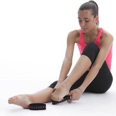 Pastorelli band on foot next to ruler for scale, clarifying fit and sizing benefits