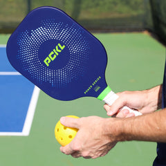 PCKL graphite face closeup showing rough-grit texture for improved spin and ball bite