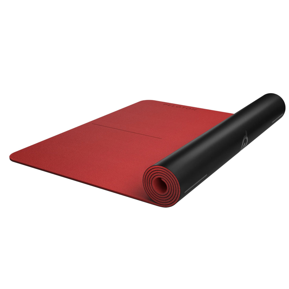 Peloton mat front view showing full size and stability benefits