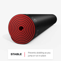 Peloton mat under athlete during HIIT demonstrating non-slip support