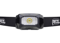 PETZL TIKKINA beam close-up demonstrating wide uniform light for comfortable tasks