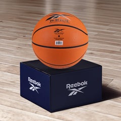 Reebok basketball in hand demonstrating anti-slip grip for confident dribbling