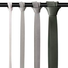 Retrospec in-use with band assisting a pull-up demonstrating progressive strength benefit