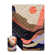 Rumpl Valley Dawn front folded showing blanket design and cozy coverage